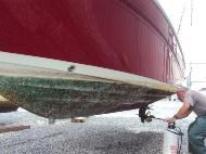 We Lift Boat off Trailer then Chemical Wash the Complete Hull & Drive